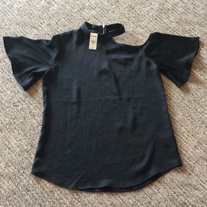 Black flutter sleeve top.